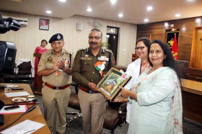 DGP Dilbag Singh being greeted with a souvenir at the Police Hospital Jammu on Friday.