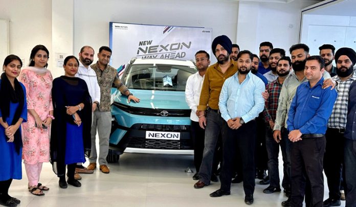 Chander Singh Katoch, General Manager, Fairdeal Motors receiving all new Nexon in Jammu on Wednesday.