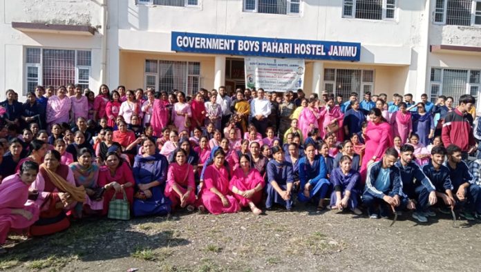 Inmates of Government Boys Pahari Hostel Jammu posing for a group photograph during an event on Saturday.