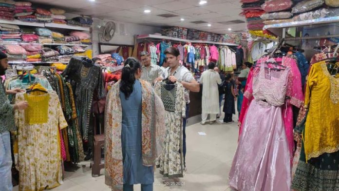 Customers busy in shopping at Vishal Mart in Jammu on Wednesday.