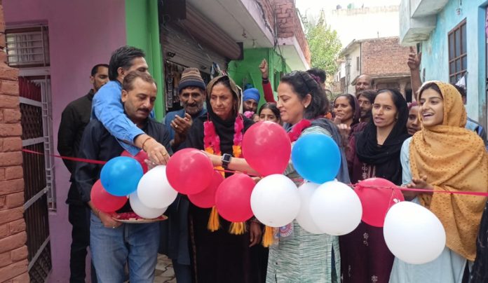 Municipal Councillor Preeti Khajuria dedicating newly constructed lane-drain in Jakhaini area to the public.