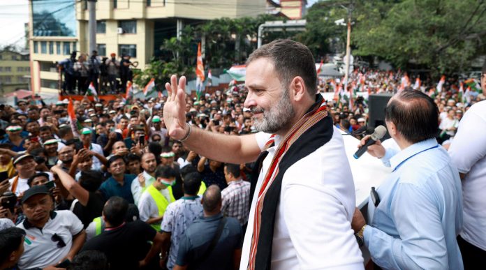 Congress leader Rahul Gandhi addressing party supporters during his Padyatra from Chanmari to Raj Bhawan, in Aizawl on Monday. (UNI)