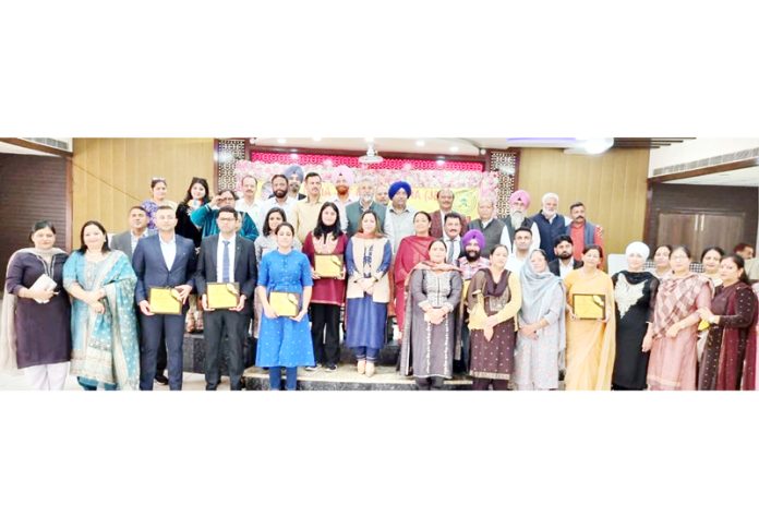 AIJMS J&K unit President, Choudhary Manmohan Singh, along with young achievers from Jat community at an event in Jammu on Sunday.