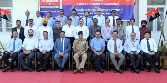Participants of five day training on 'Investigation of Cyber Crime' along with others at SKPA Udhampur on Tuesday.