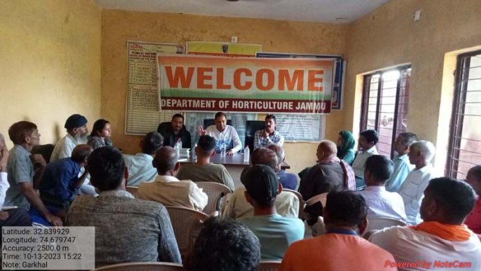 Officers of Horticulture Department and farmers during an awareness camp at Garkhal in Jammu district.