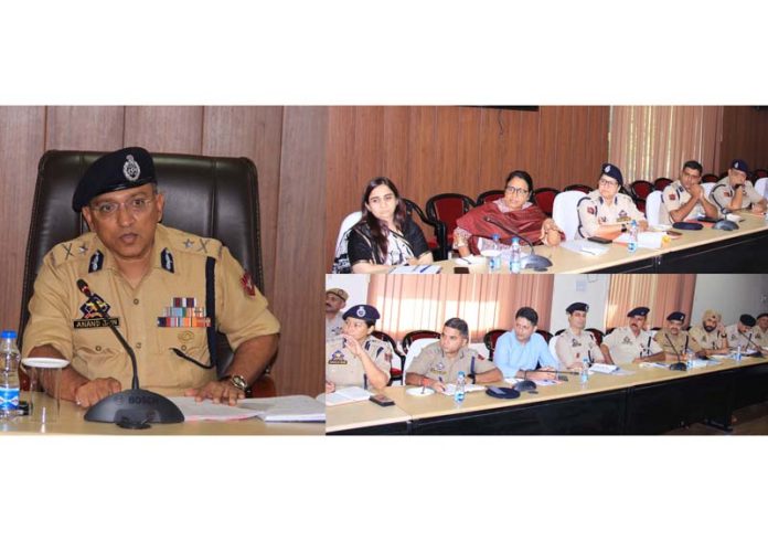 IGP Jammu, Anand Jain chairing a meeting of the police officers on Friday.