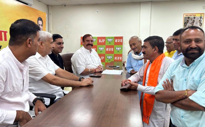 BJP leaders listening public grievances at Jammu on Thursday.