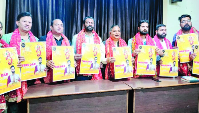 BJP leader, Sat Sharma along with others releasing devotional song ‘Tere Dar Te Aava Gye’ at Jammu on Tuesday.