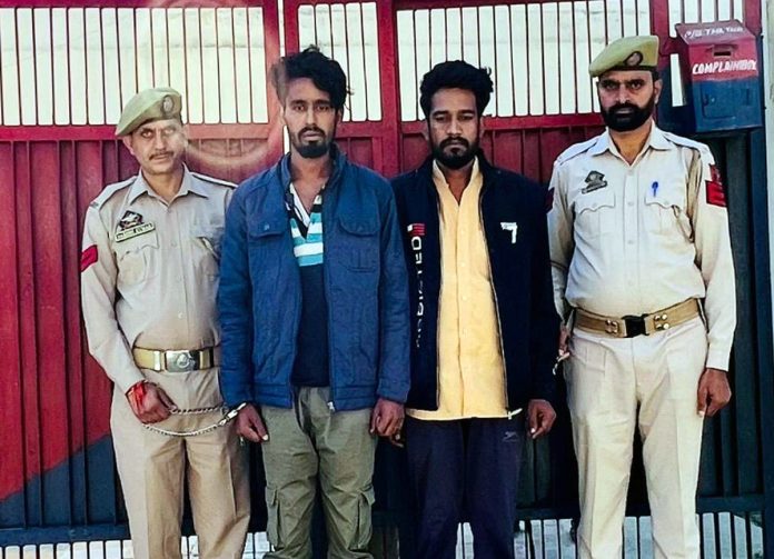 Doda Police presents two fraudsters after their arrest from UP. — Excelsior/Tilak Raj