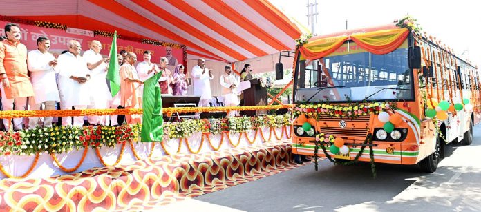 Uttar Pradesh Chief Minister Yogi Adityanath flaging off the new BS-VI buses (Mission Mahila Sarathi) on the occasion of 'Maha Ashtami', in Ayodhya on Sunday. (UNI)