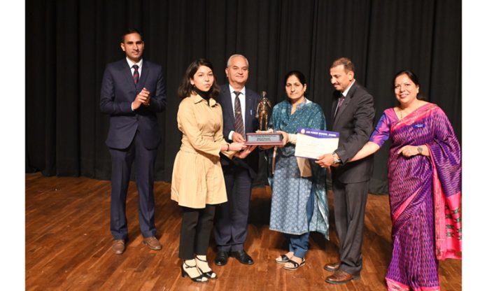 Student of Air Force School receiving Late Flight Lieutenant Adivitya Bal trophy.