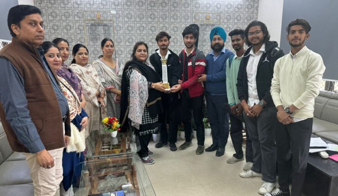 Principal Government Degree College Kathua Prof. Seema Mir felicitating winners of display your talent.