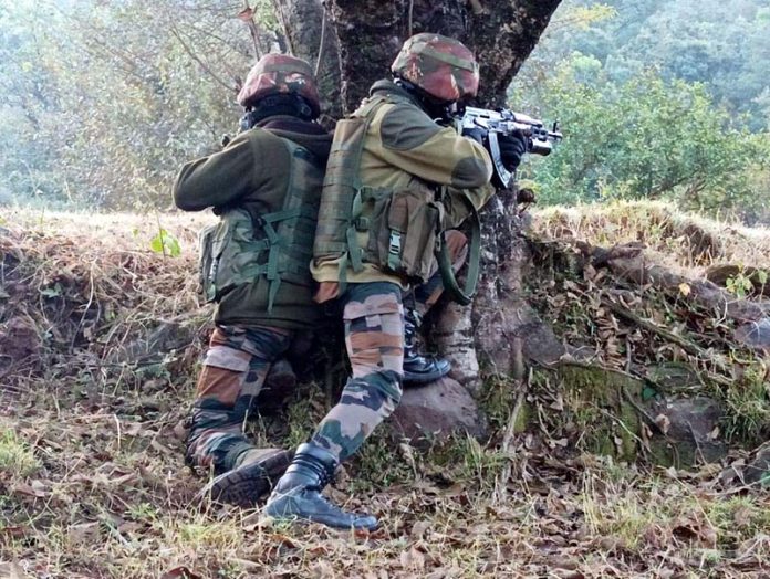 Troops during encounter at Bajimaal Dharamshal on Thursday morning. -Excelsior/Imran