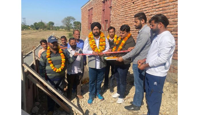 BJP Kissan Morcha president and DDC Member, Ramgarh Sarbjit Singh Johal kick starting development works in village Kamor on Friday.