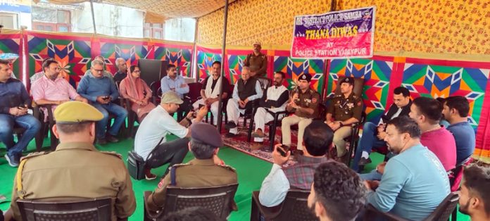 SSP Samba and other officers interacting with prominent people at Vijaypur on Thana Diwas on Thursday.