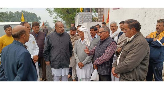 Senior BJP leader Devender Singh Rana during visit to Nagrota.
