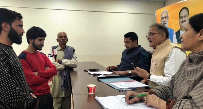 BJP leaders listening public grievances at party office, Trikuta Nagar on Tuesday.