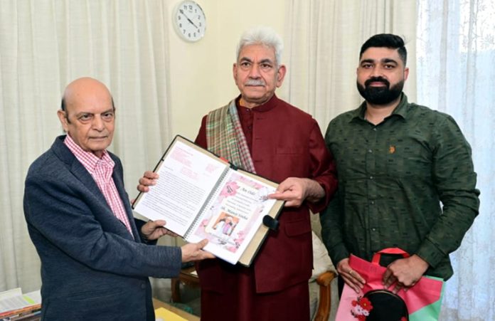 LG Manoj Sinha releasing Padma Shri Dr Jitendra Udhampuri’s poetry at Raj Bhawan in Jammu.