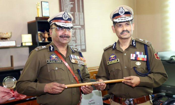 RR Swain taking over as the DGP from Dilbag Singh in Srinagar on Tuesday.