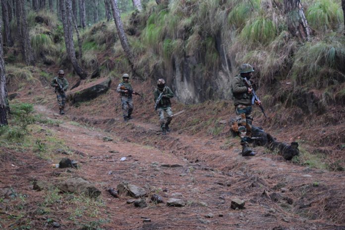 Troops during search operation at Bajimaal in Dharamshal area of Kalakote on Wednesday. -Excelsior/Imran