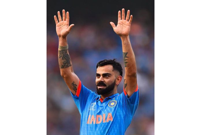Virat Kohli celebrates his century during the semi-final match against New Zealand in the ICC Men's Cricket World Cup 2023, at Wankhede Stadium in Mumbai on Wednesday. (UNI)