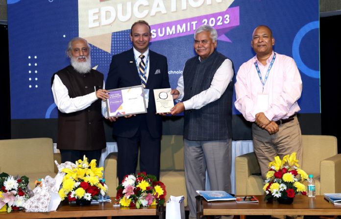 Prof. Adit Gupta Director/Principal of MIER College of Education receiving New Code of Education Awards 2023 at Delhi.