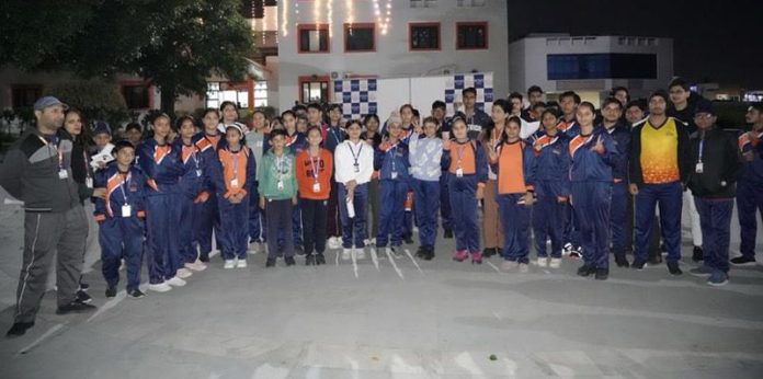Students of Birla Open Minds International School posing with medals after Cross Country Run.