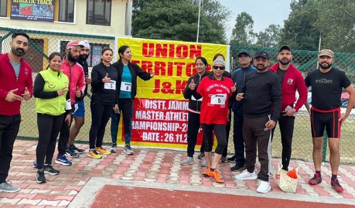 Athletes posing during Jammu District Masters Athletics Championship.