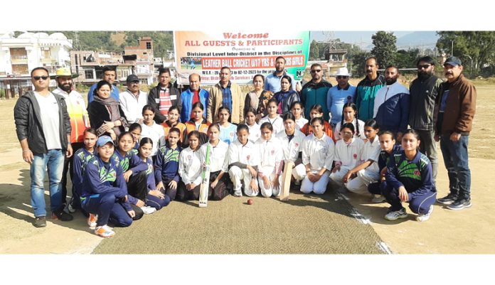 Female players posing with dignitaries during a cricket tournament at Udhampur. 