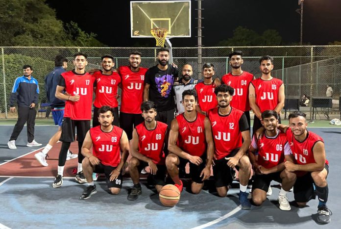Jammu University Basketball team posing for group photograph.