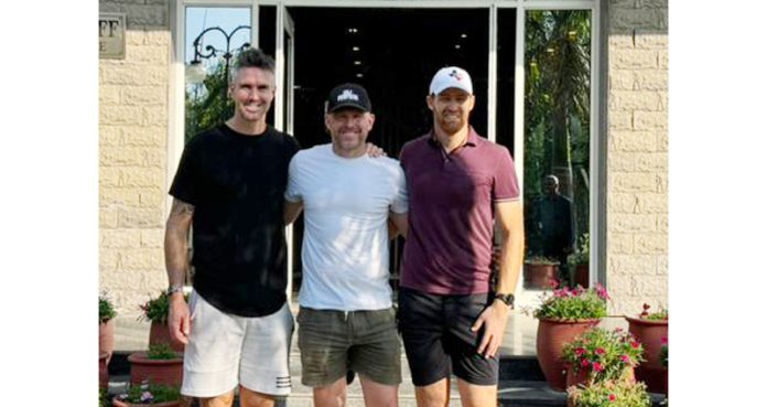 Martin Guptil, Kevin Pietersen along with fellow cricketer of Legends League posing outside Golf Course in Jammu on Tuesday.