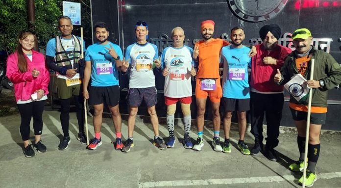 Jammu runners posing for group photograph during half marathon in Rishikesh.