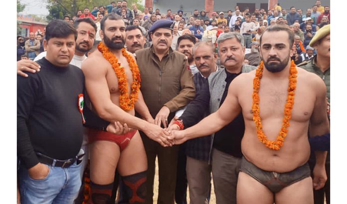 Chief guest introducing wrestlers before Dangal at Akhnoor on Tuesday. 