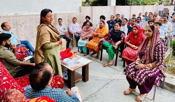BJP district president South, Rekha Mahajan addressing a meeting at Greater Kailash on Tuesday.