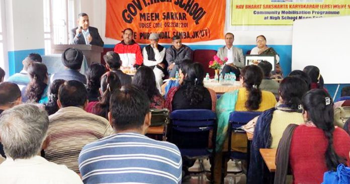 A speaker addressing a gathering at Govt High School, Meen Sarkar, Samba on Saturday.