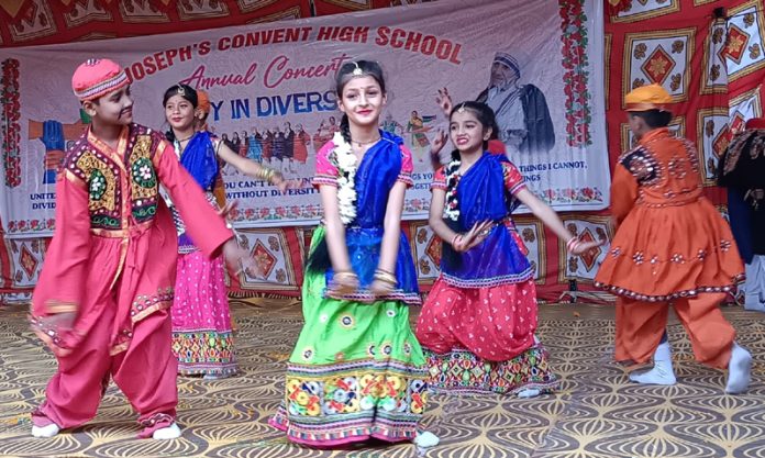 Students performing cultural items during Annual Day event in school.
