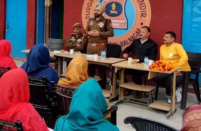 DySP Udhampur Gurmeet Singh briefing people on drug abuse, cyber crimes.