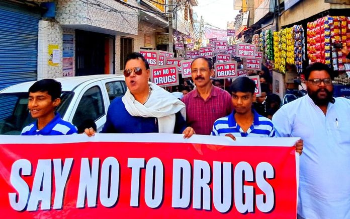 Students of Rainbow Public School Rampura taking out a drug awareness rally in Shastri Nagar, Jammu.