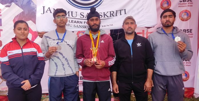 Medal winning athletes of Jammu Sanskriti School, Jammu posing with medals.