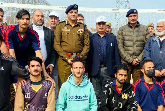 CO-11 Bn IRP Sandeep Mehta posing with Volleyball players in Anantnag.