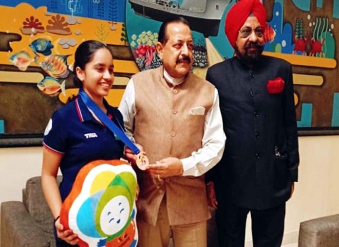 Union Minister of State, Dr Jitendra Singh posing with Shooter Aneesha and S.S. Sodhi, President JKRA at Delhi.