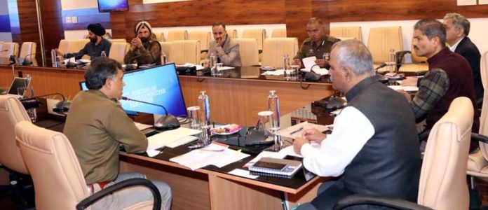 DGP RR Swain chairing a meeting of the police officers in Jammu on Thursday.