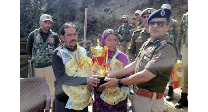 SSP, Kishtwar presenting trophy to parents of Archer Sheetal Devi as a gesture of recognition for her outstanding achievements.