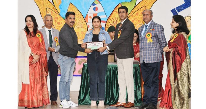 Chief guests presenting certificates to students during Annual Day on Wednesday.