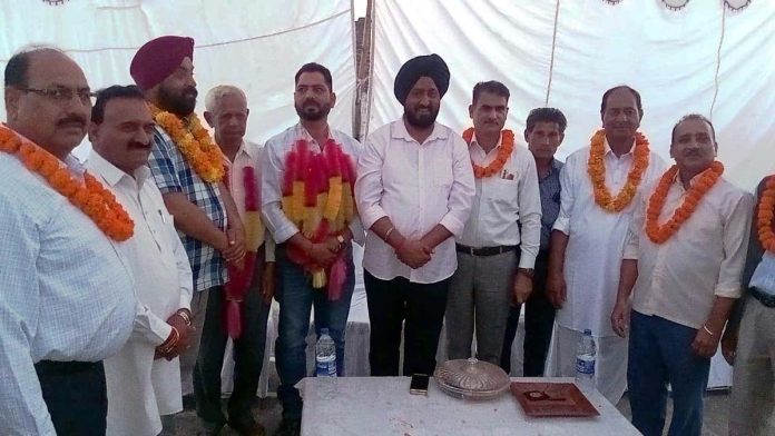 Taranjit Singh Tony, General Secretary of J&K PCC along with the people who joined Congress party in Jammu on Tuesday.