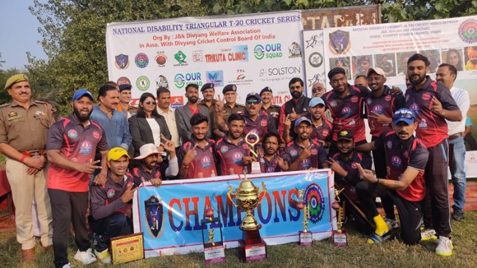 Disabled Cricket team of Baroda posing with winner’s trophy in Jammu.