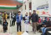Chief Guest presenting medal to winner in Kargil during 13th District Kargil Taekwondo Championship.
