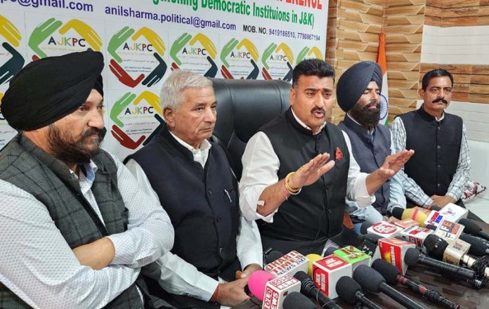 AJKPC president, Anil Sharma, flanked by other senior members addressing press conference in Jammu on Monday. -Excelsior/Rakesh