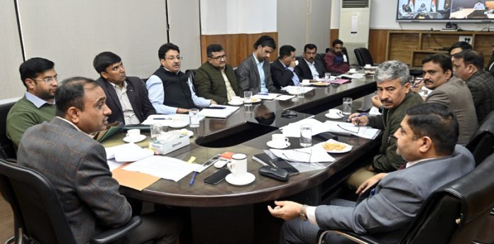 Div Com Jammu chairing a meeting on Saturday.