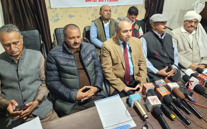 Convenor, All J&K Gujjar-Bakerwal Co-ordination Committee, Anwar Choudhary, flanked by others addressing press conference in Jammu. —Excelsior/Rakesh